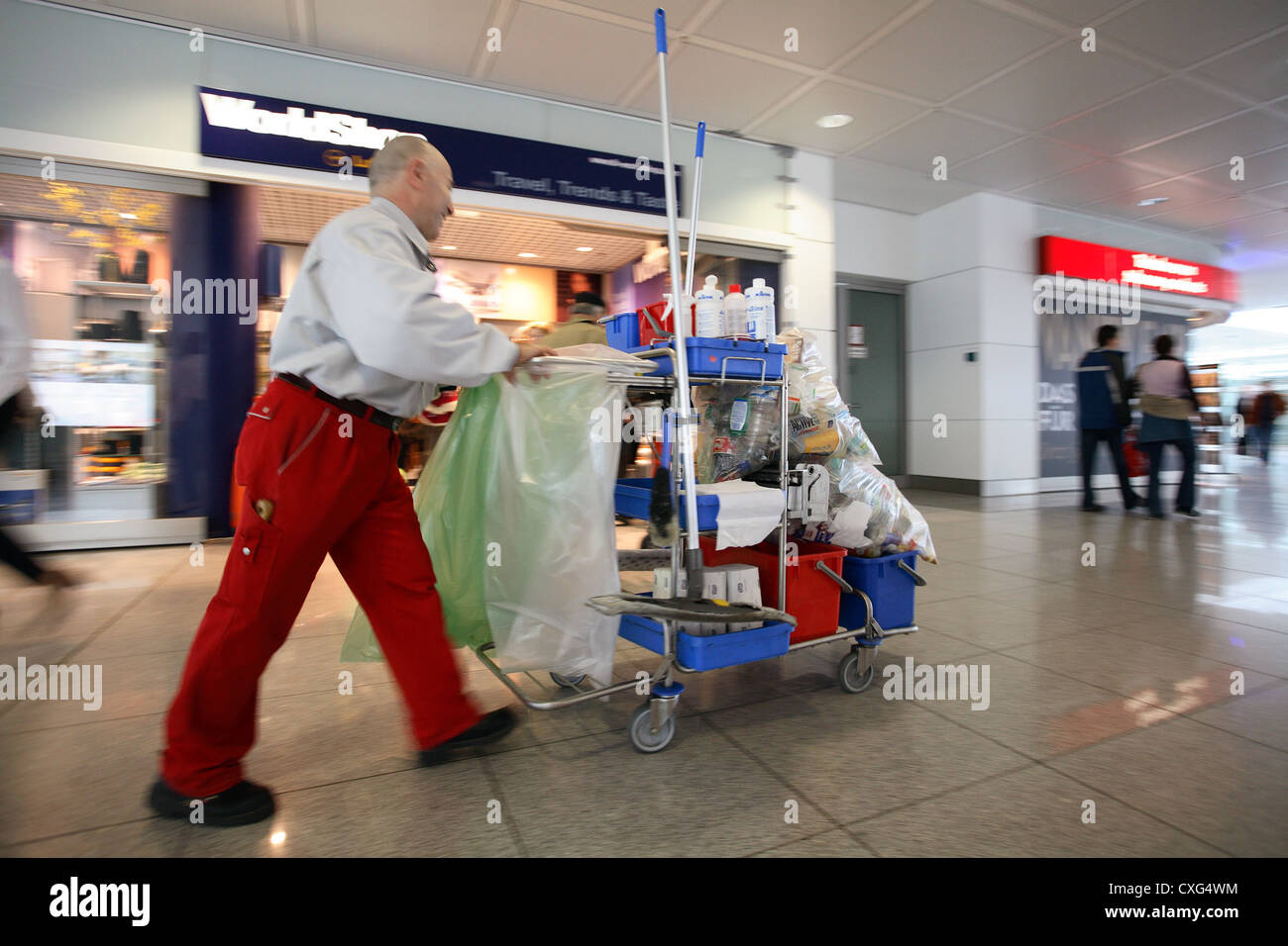 Muenchen, cleaning staff at work in the airport, Franz Josef Strauss Stock Photo