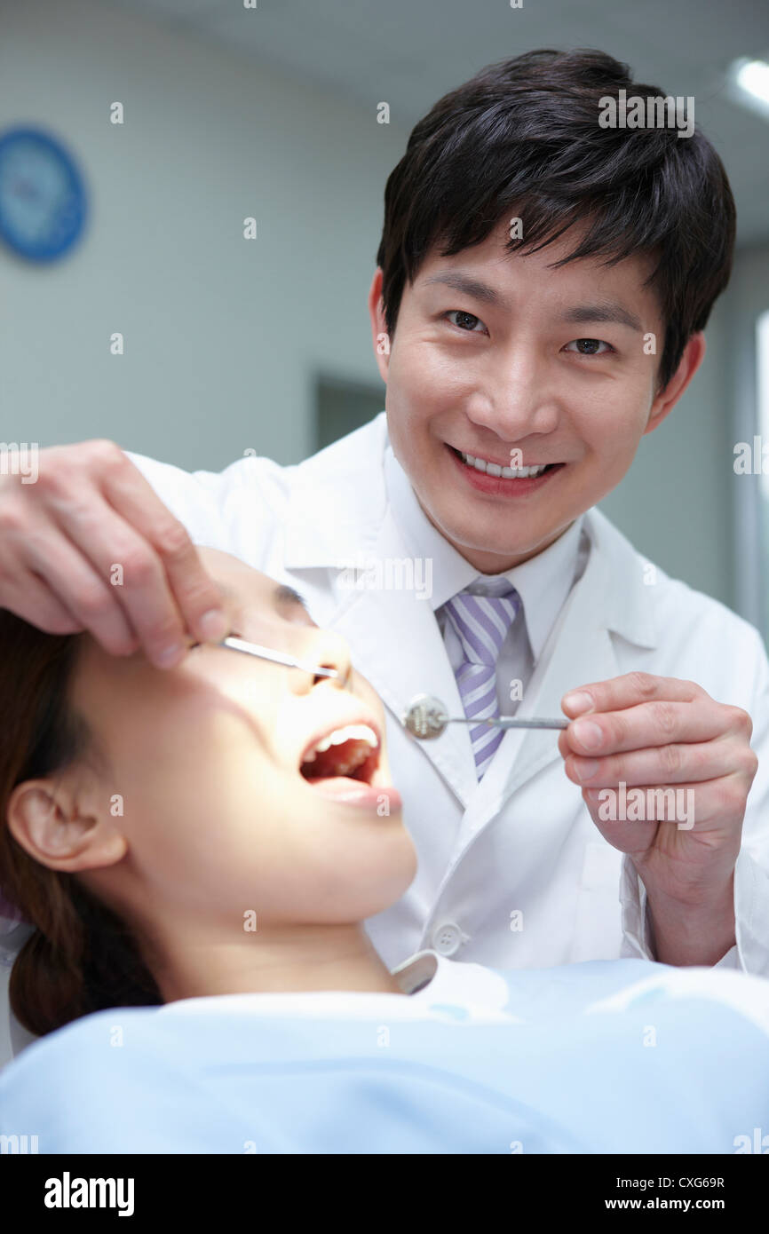 A patient having a dental treatment Stock Photo Alamy