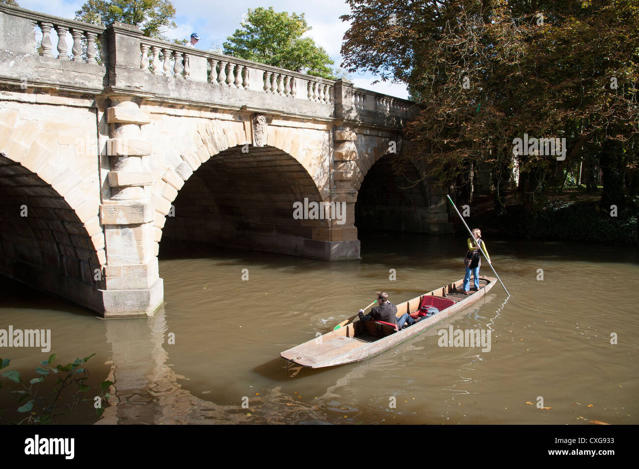 Punting along the River Cherwell at Magdalen Bridge in Oxford England UK Stock Photo