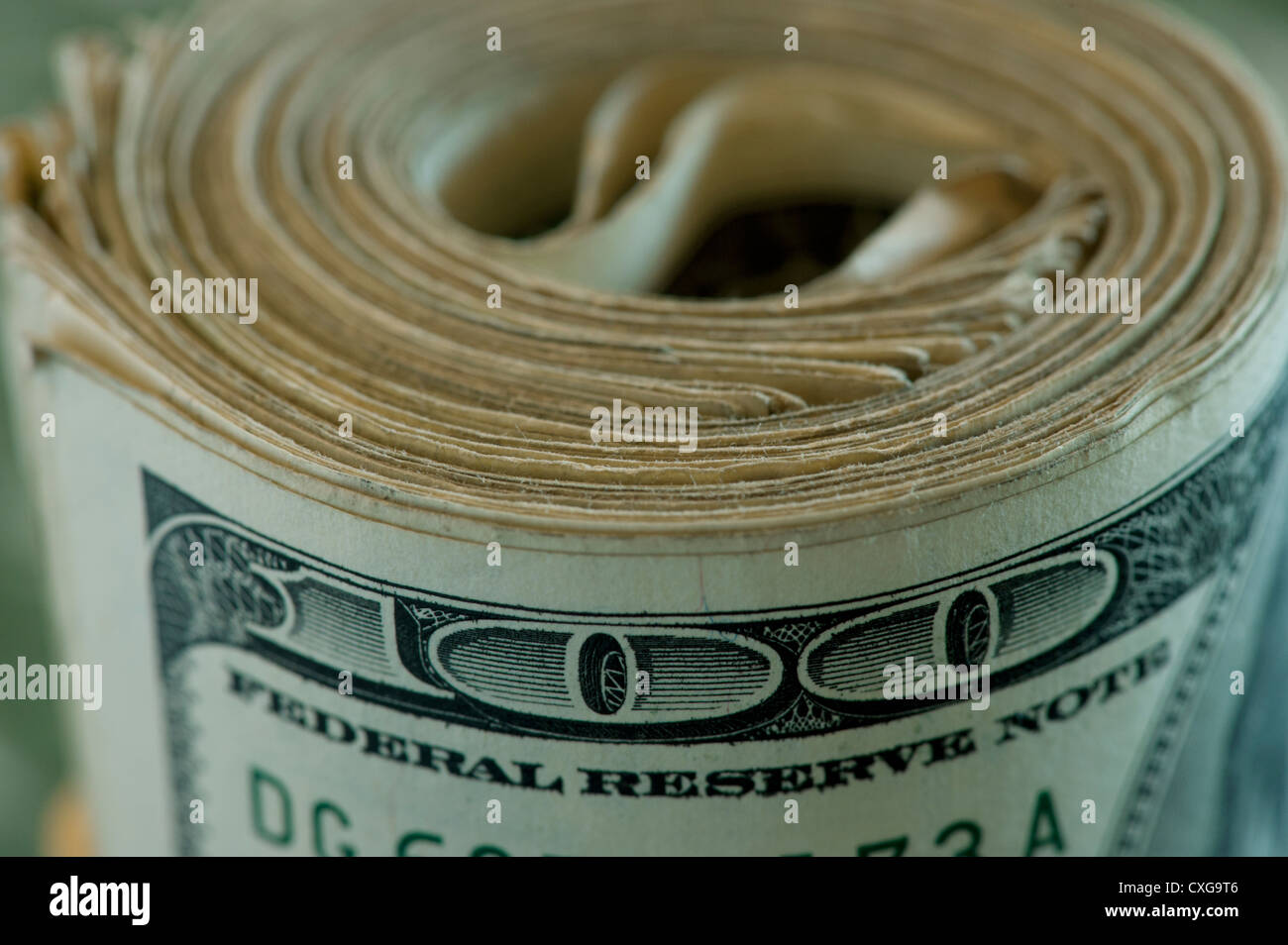 roll of money 100 dollar bills USA Stock Photo