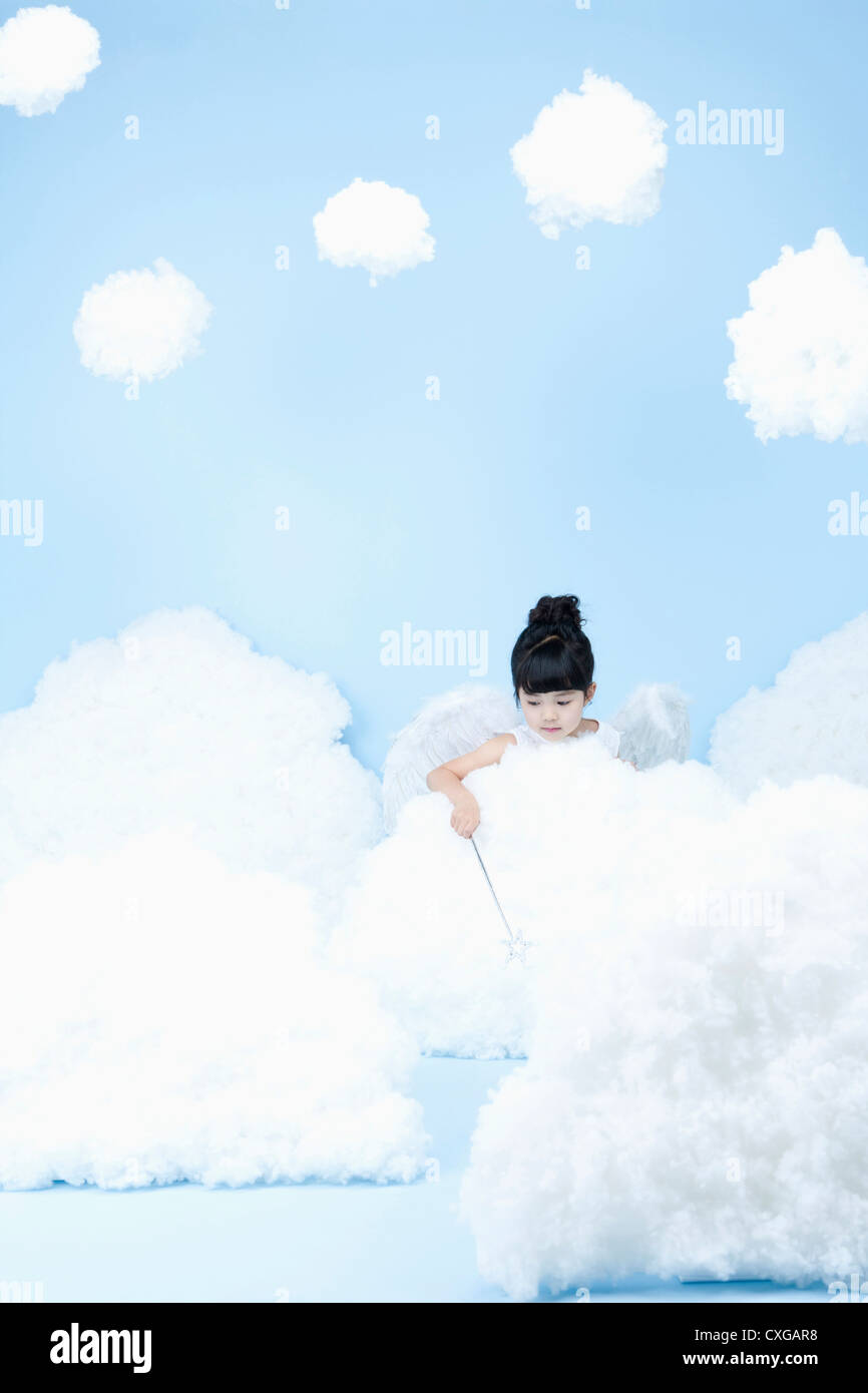 little girl looks of angel on the clouds Stock Photo - Alamy