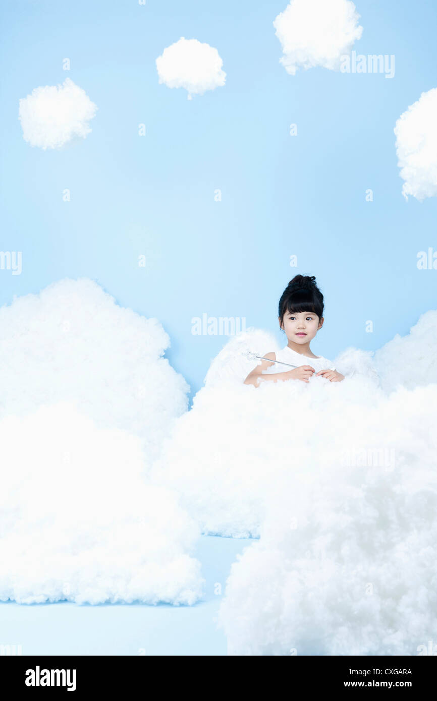 little girl looks of angel on the clouds Stock Photo - Alamy