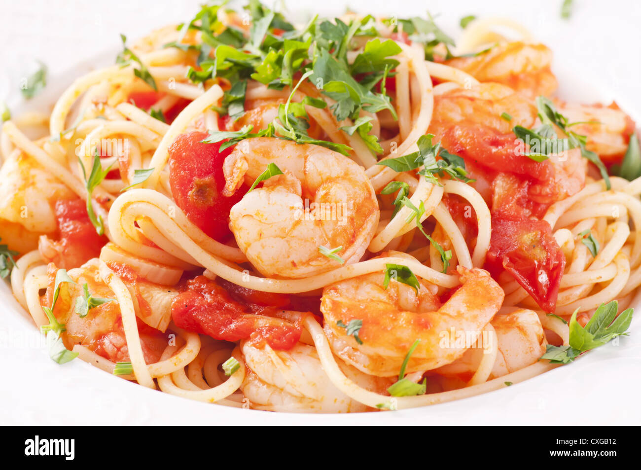 Spaghetti Diablo with chili king prawn Stock Photo Alamy