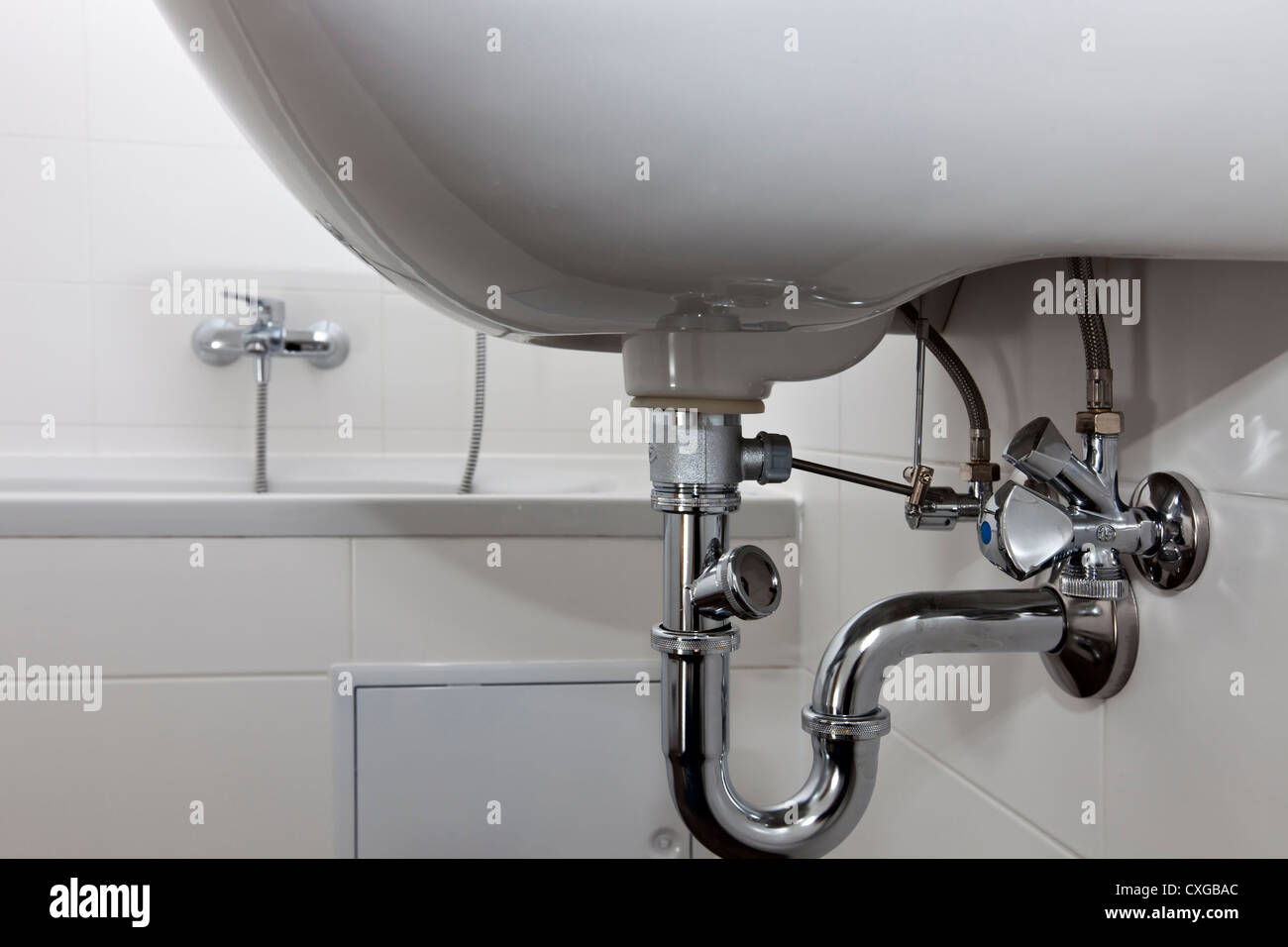 Sewage pipe of a Sink in a modern bath room Stock Photo