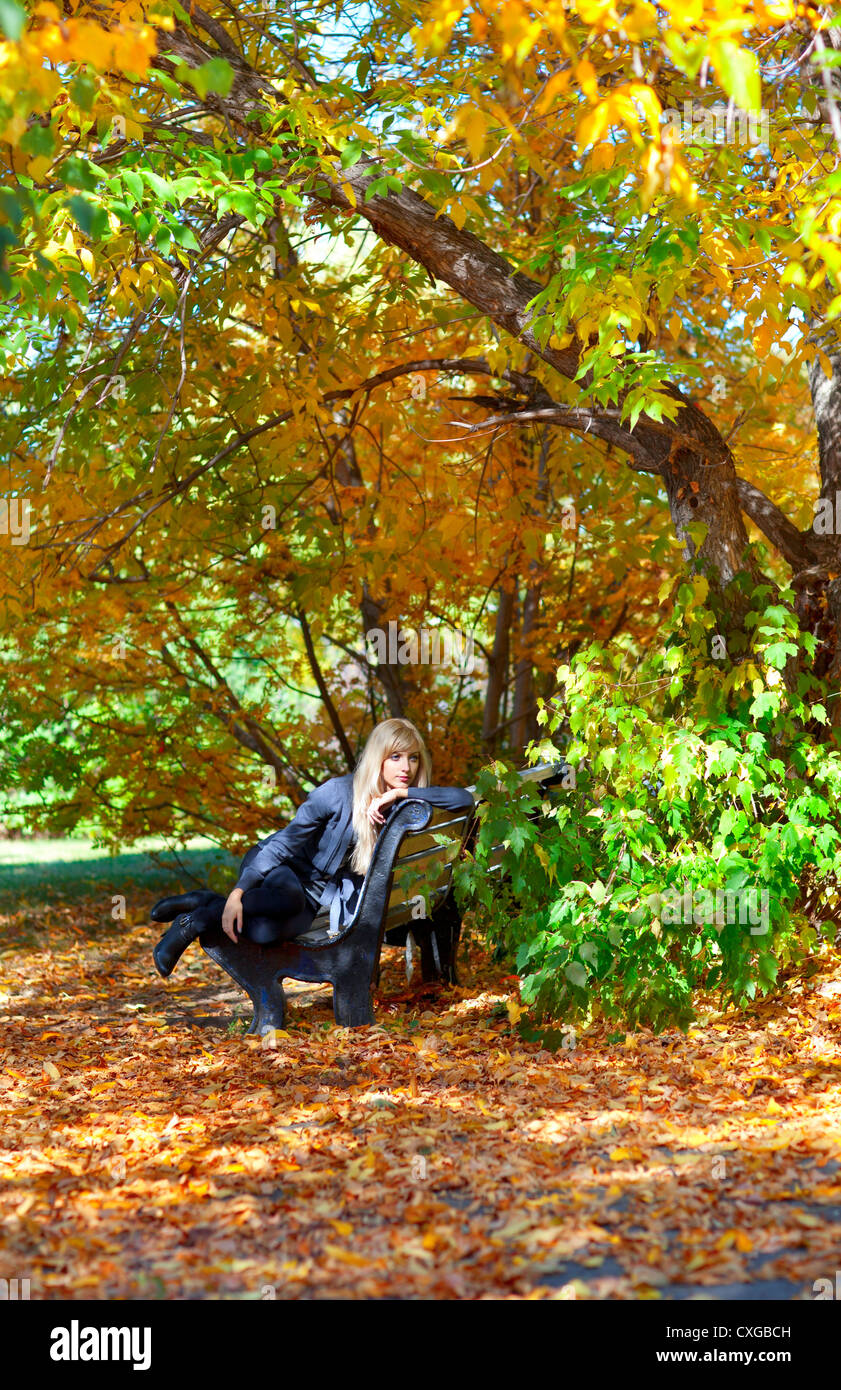 girl on a bench in park Stock Photo - Alamy