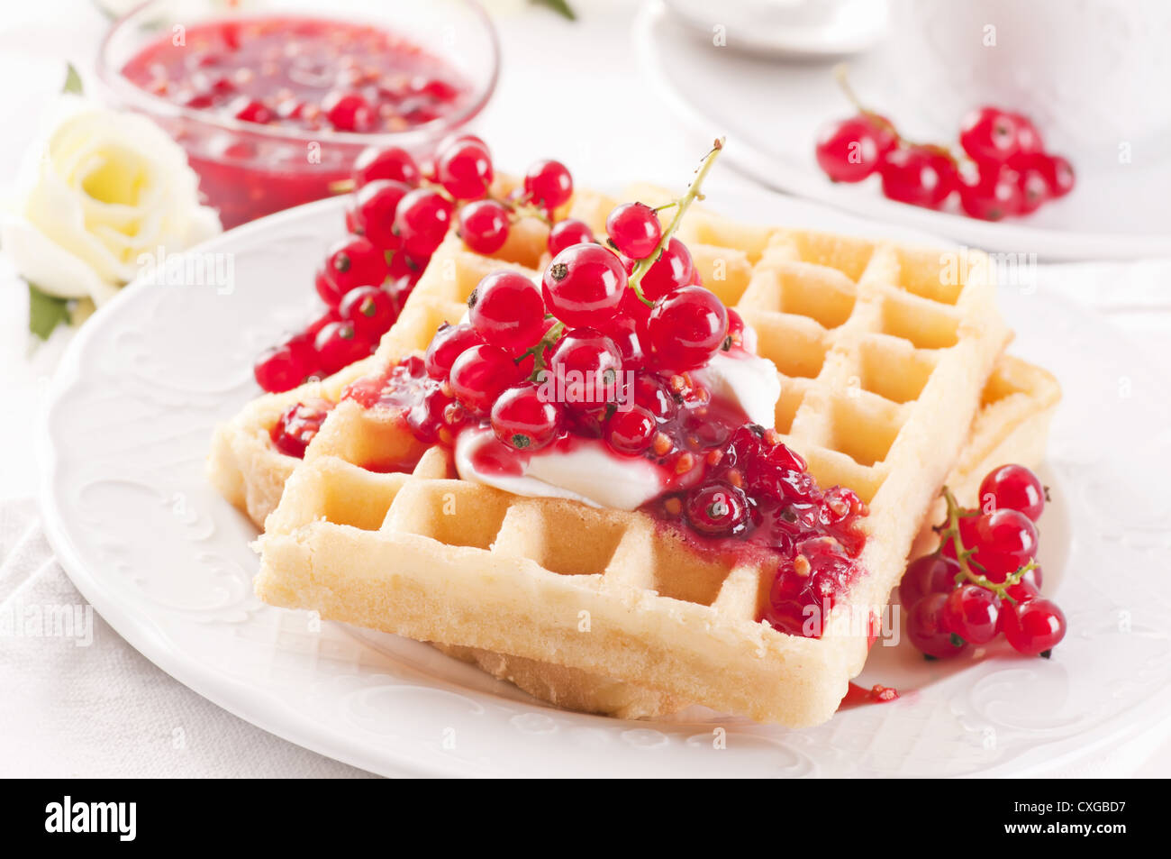 WAffle with redcurrant jelly and mascarpone Stock Photo