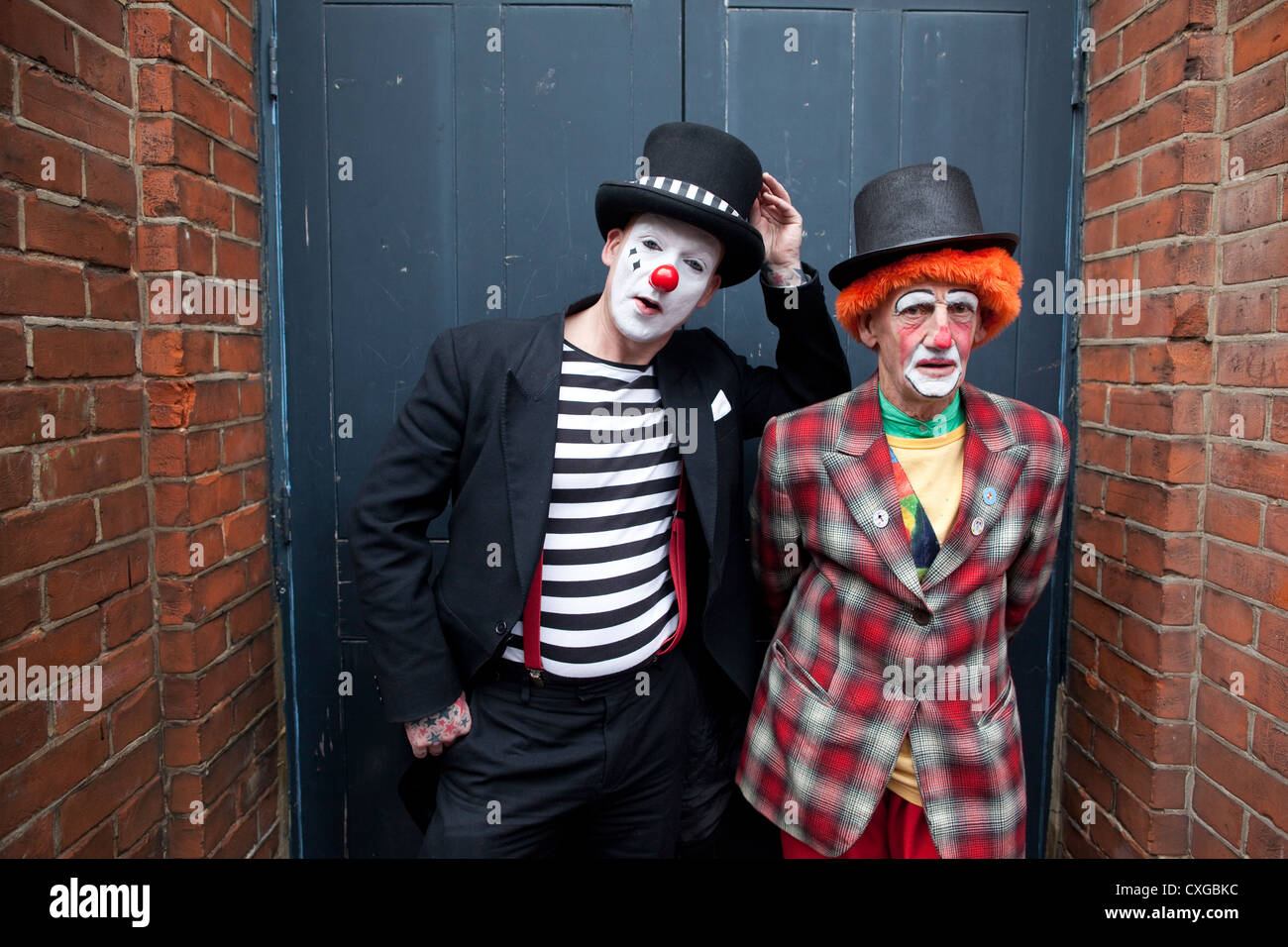 Clowns at the Holy Trinity Church in Dalston, east London to attend a church service in memory of Joseph Grimaldi, England, UK Stock Photo
