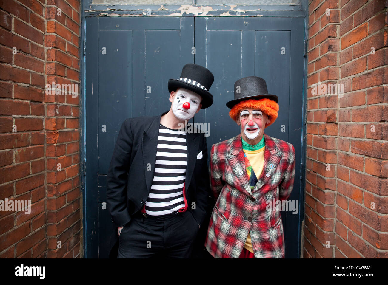 Clowns at the Holy Trinity Church in Dalston, east London to attend a church service in memory of Joseph Grimaldi, England, UK Stock Photo