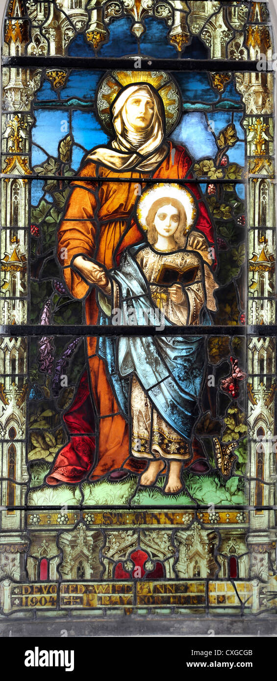 Surrey England Sutton Church of Our Lady Of The Rosary Stained Glass Window Of Saint Ann Teaching The Virgin Mary To Read Stock Photo
