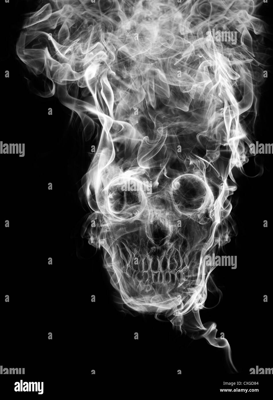 skull of the smoke. Of smoke formed skull dead, as a symbol of the dangers of smoking to health and imminent death of people. Stock Photo