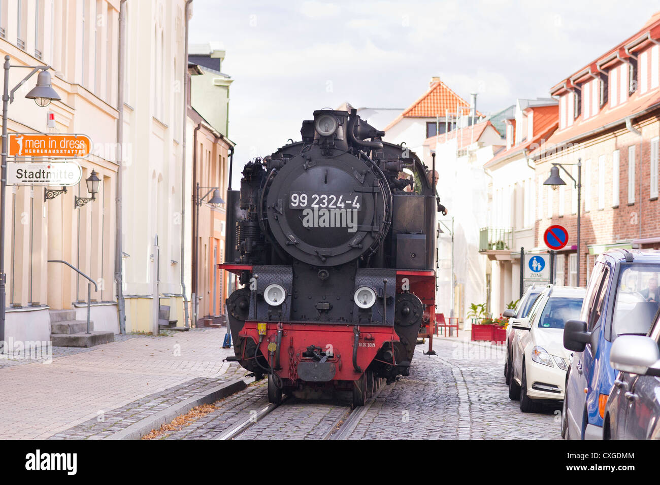 Steam locomotive pulling a passenger train. The Molli bahn at Bad Doberan - Germany Stock Photo