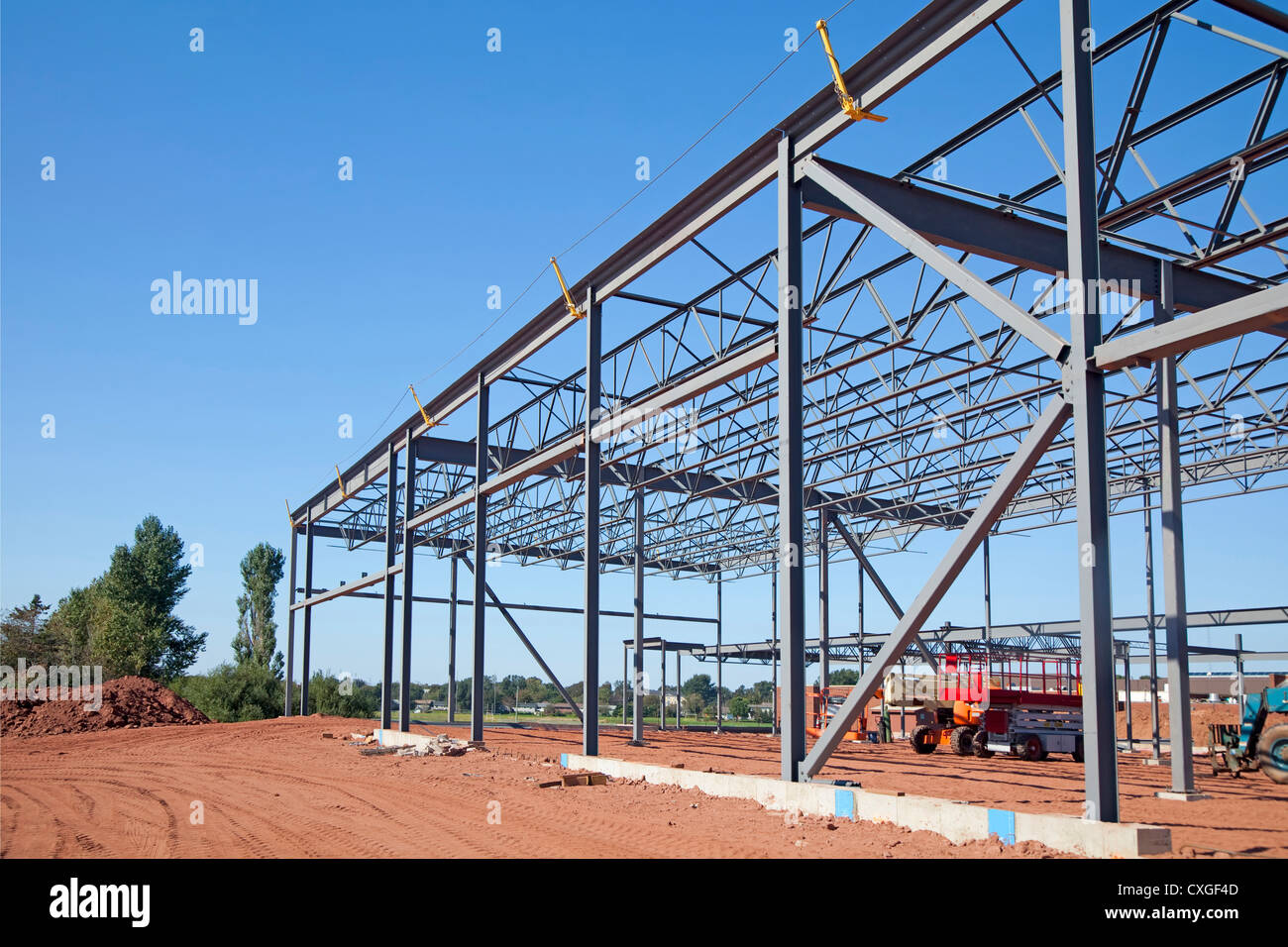 Work site and large steel frame of a large commercial building. Stock Photo