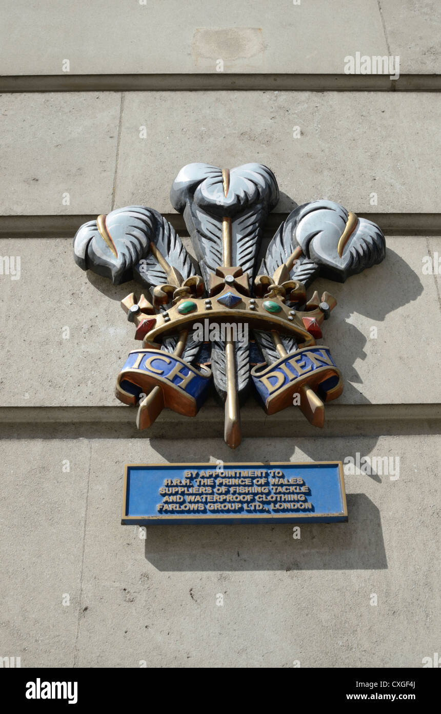 Prince of Wales's feathers Badge outside a shop in Pall Mall, London, England Stock Photo