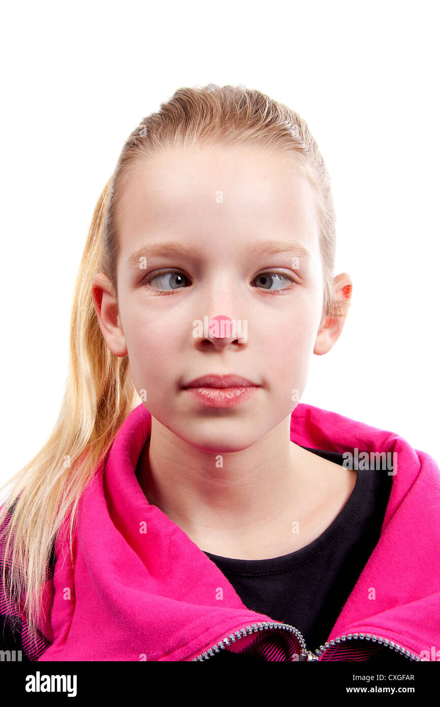 cross-eyed girl with red dot on nose over white background Stock Photo