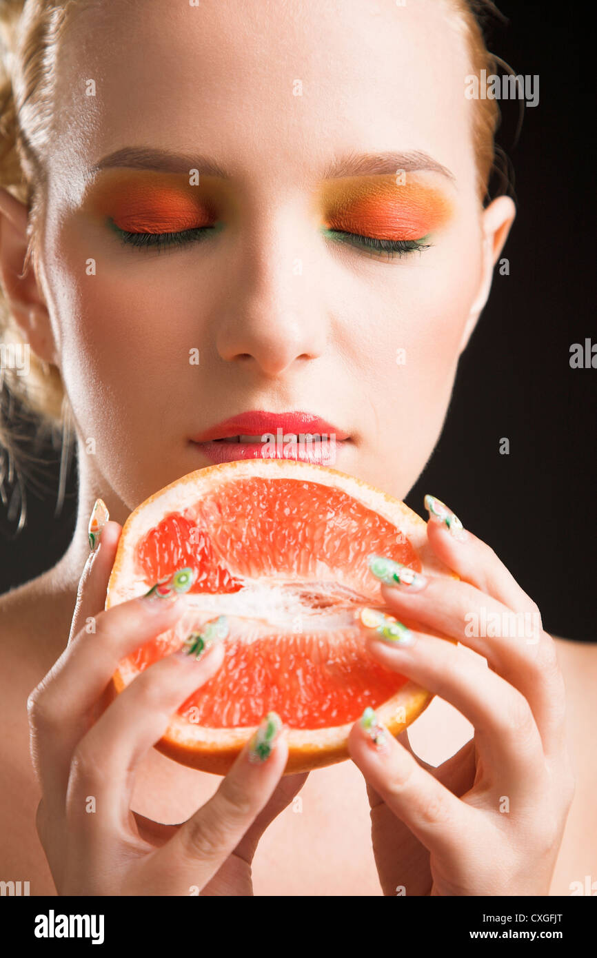 woman with grapefruit Stock Photo Alamy