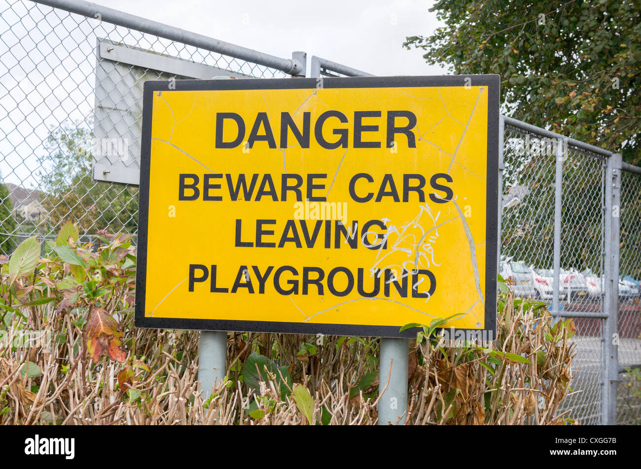 Badly composed sign outside a UK school Stock Photo