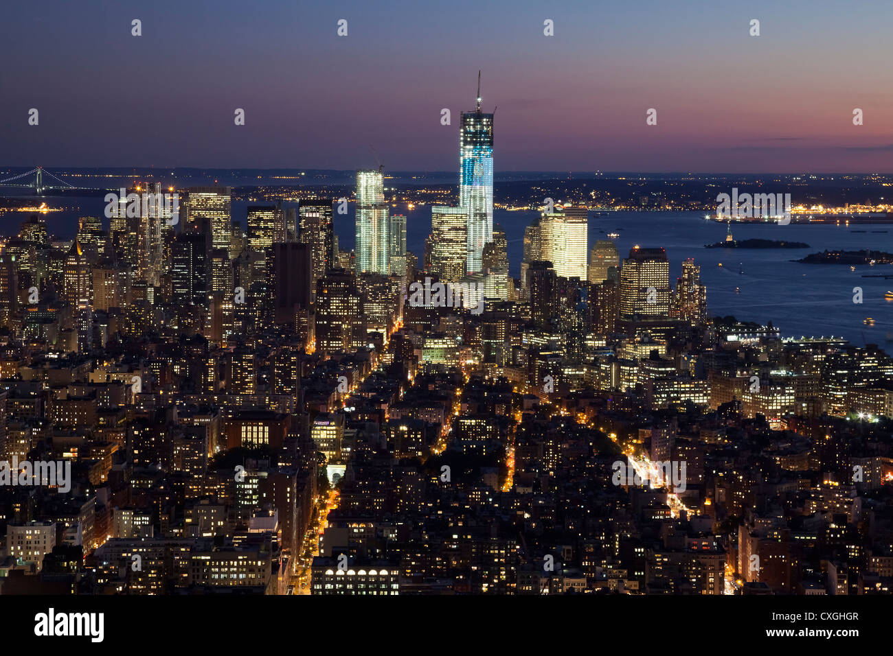 The New York City skyline at twilight w the Freedom tower Stock Photo ...