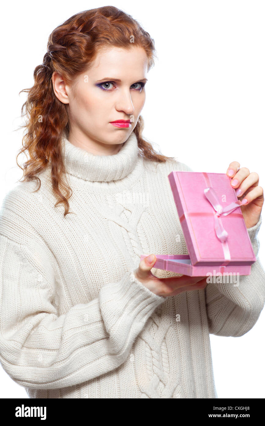 Portrait of a sad girl with a gift Stock Photo
