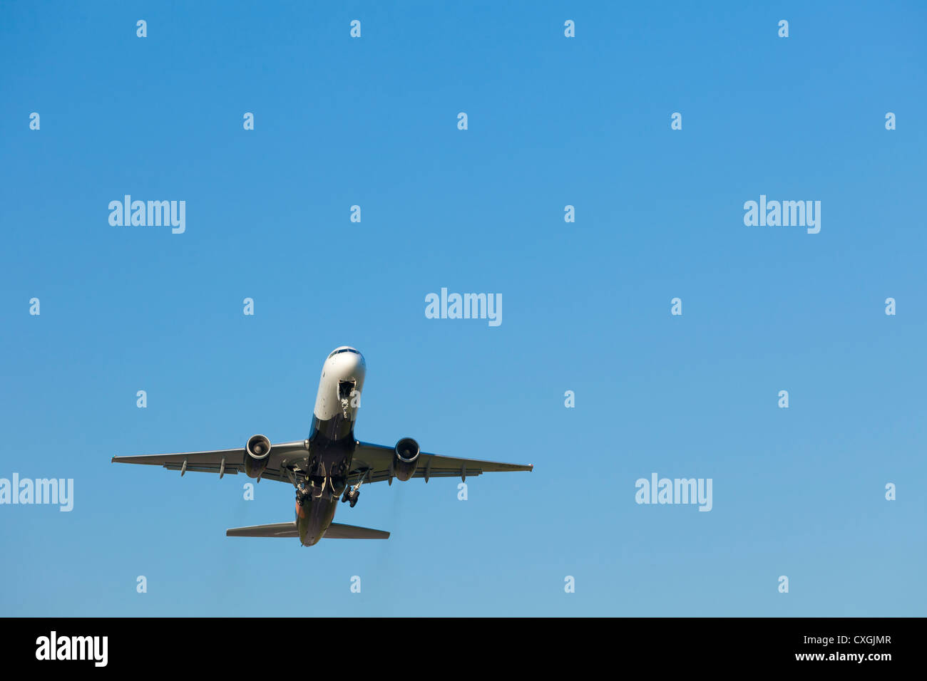 Airplane airborne after take off, England Stock Photo