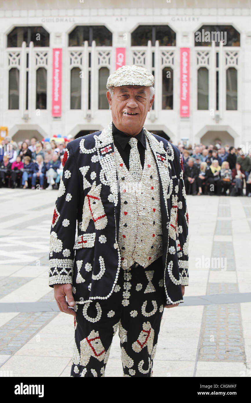 The Pearly Kings & Queens Costermongers’ Harvest Festival held at Guildhall Yard, & St Mary-le-Bow Church, London, England, UK Stock Photo