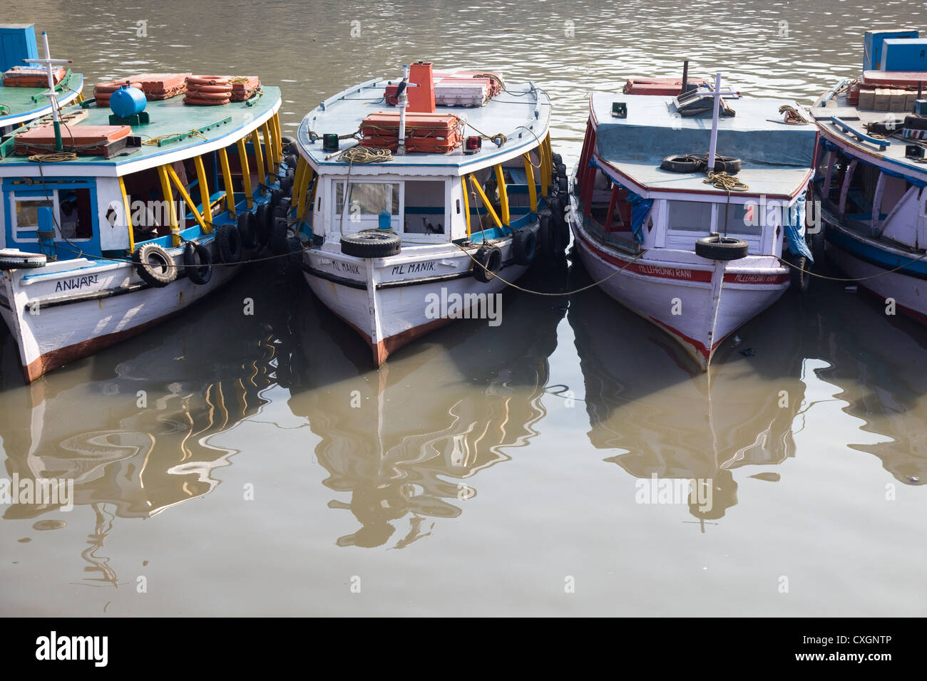 Traditional boats moored near the Gateway to India, Mumbai, India. Stock Photo