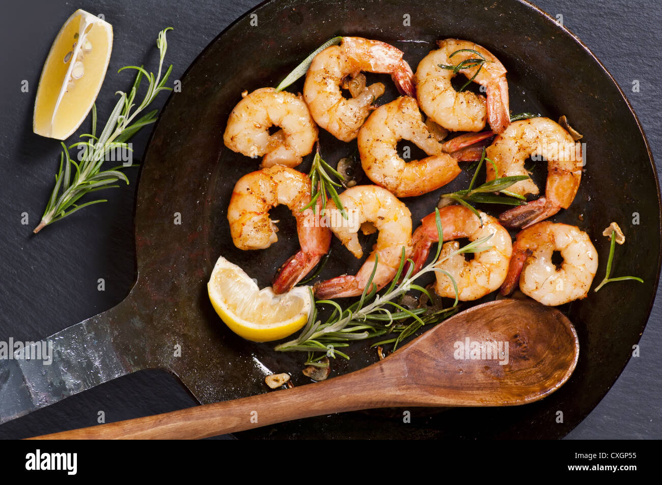 fried gambas with fresh rosmarin Stock Photo