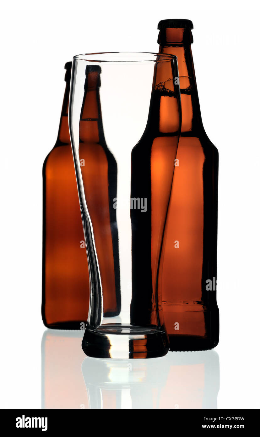 Glass and two bottles of beer on a white background, isolated Stock Photo