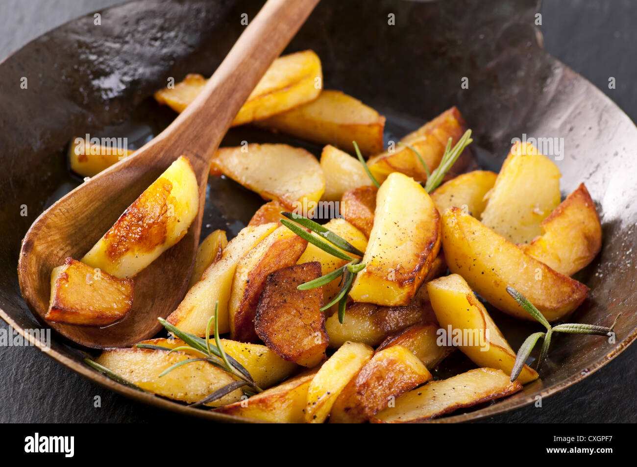 fried potato with rosmarin Stock Photo