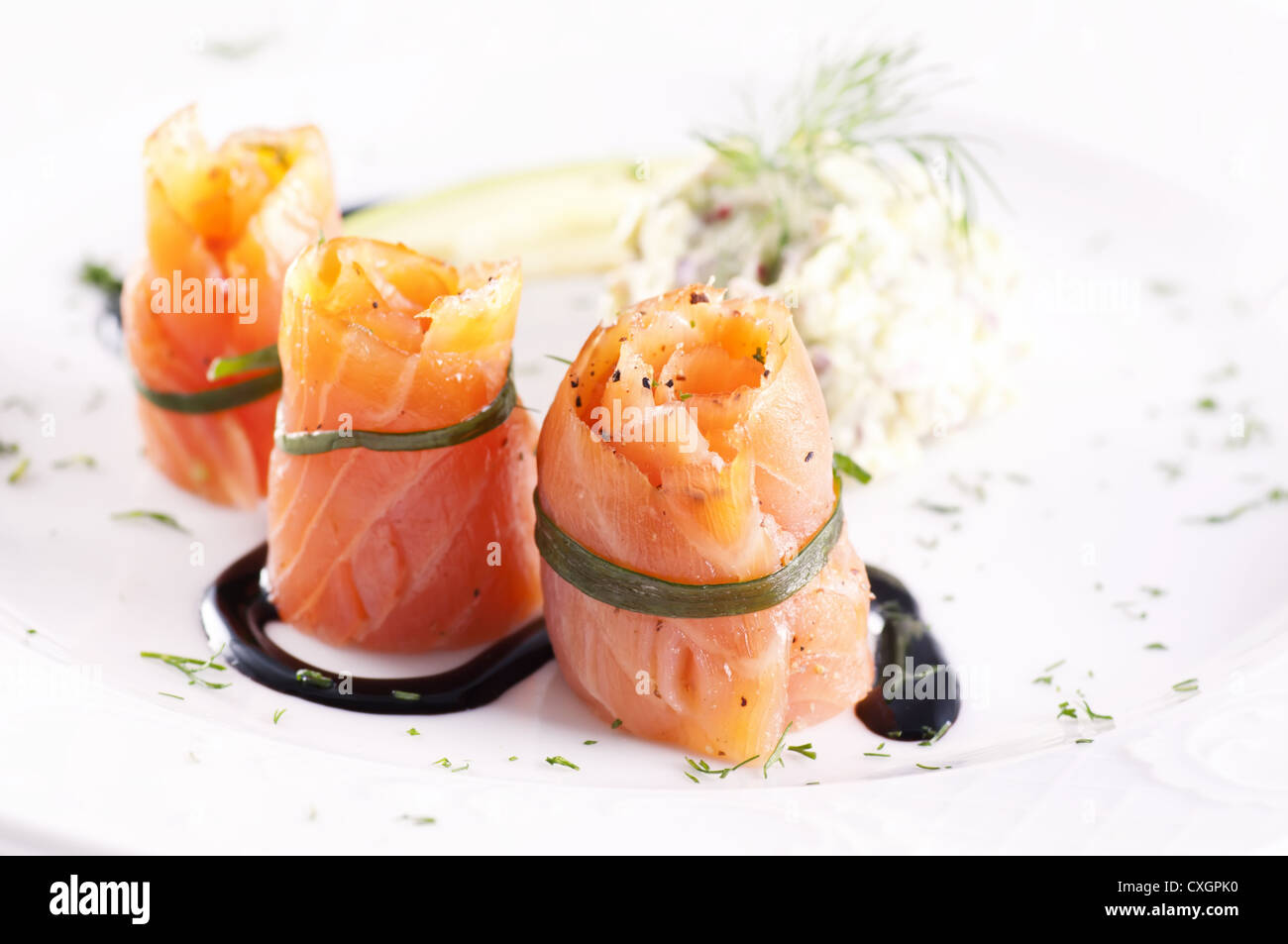 Salmon rolls with avocado cream Stock Photo