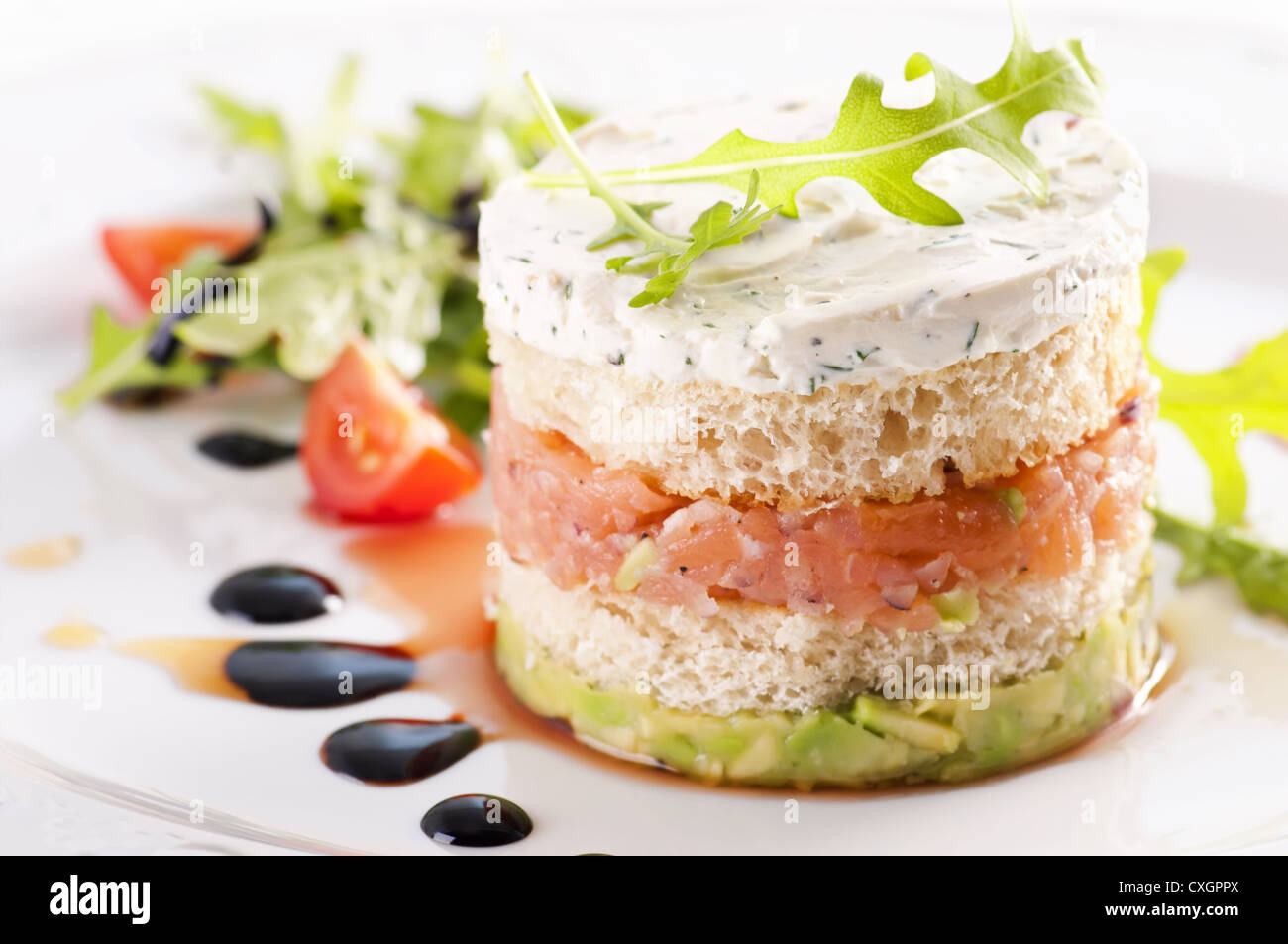 Salmon Tartare with avocado cream Stock Photo