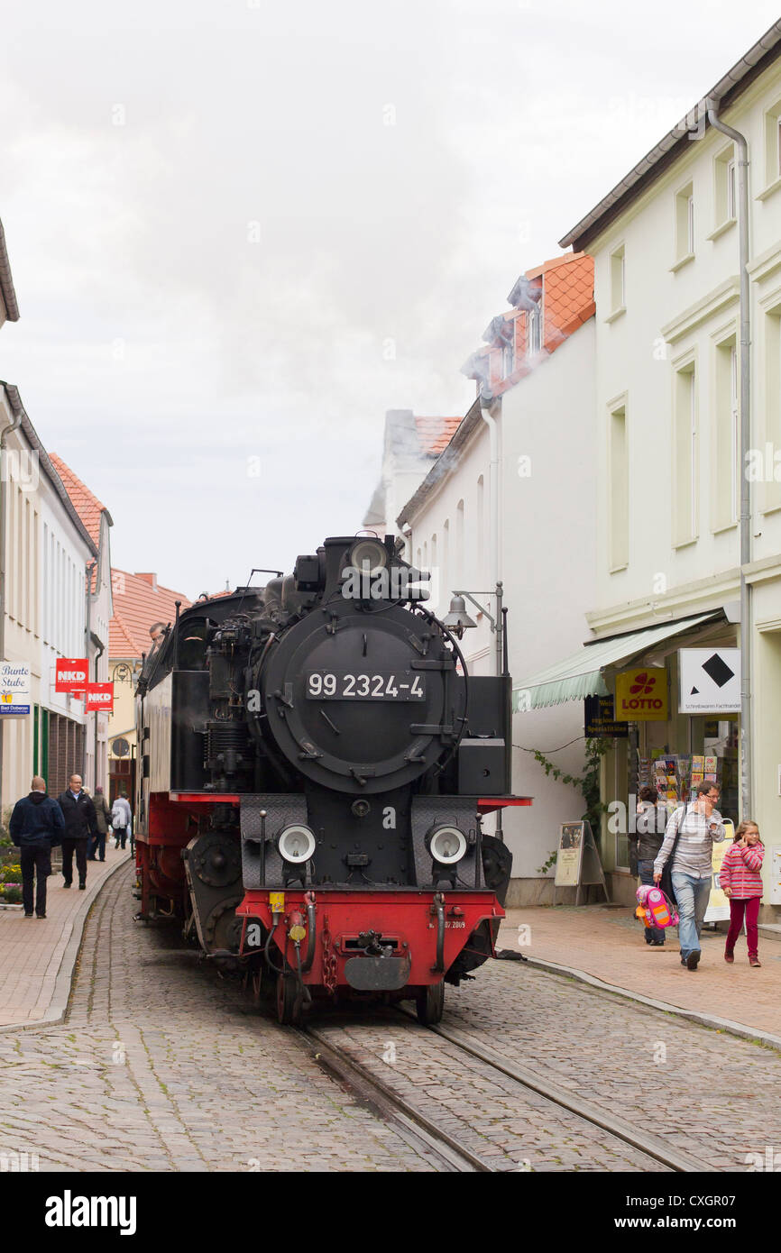 Steam locomotive pulling a passenger train. The Molli bahn at Bad Doberan - Germany Stock Photo