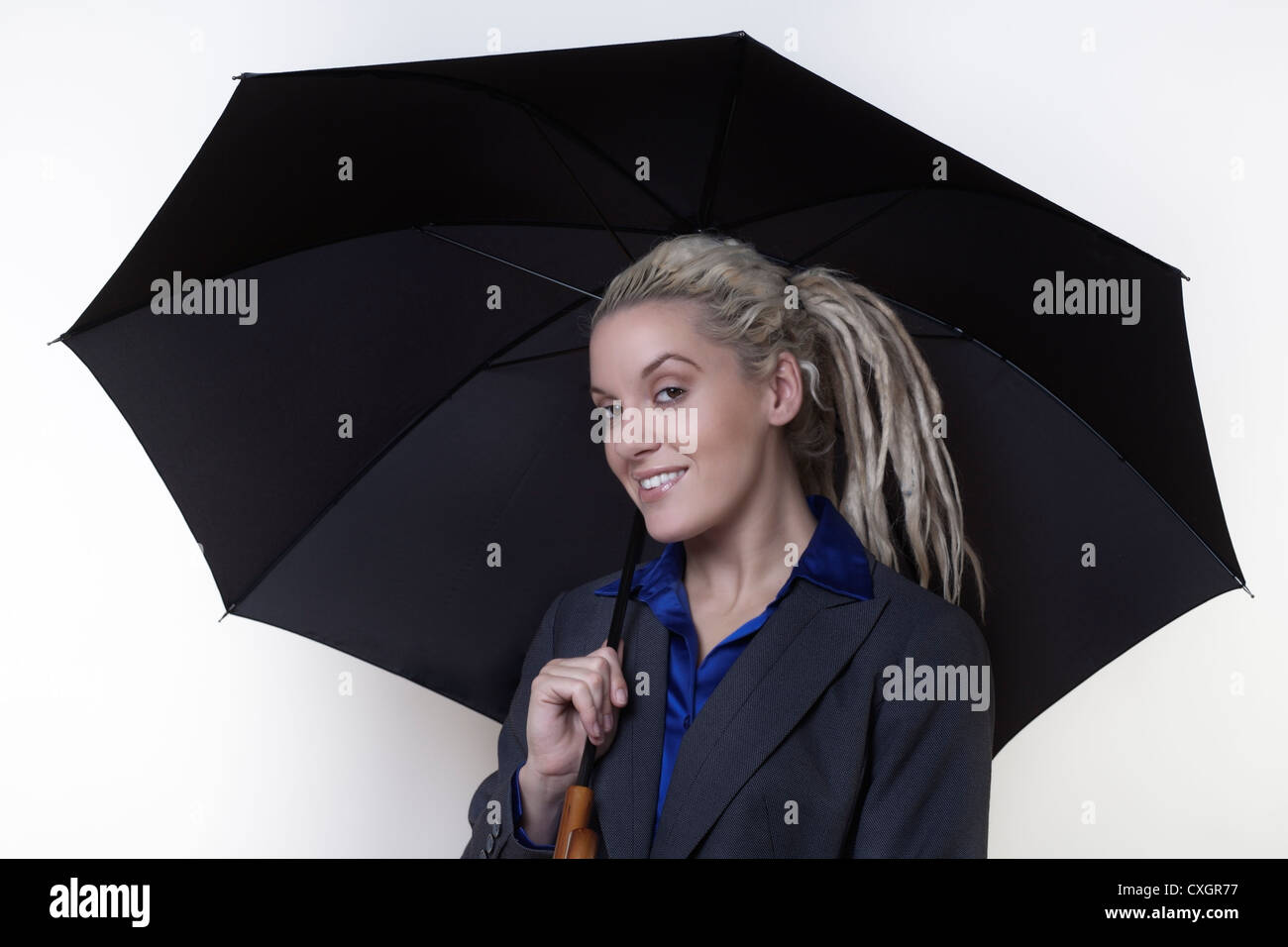 Woman dreadlocks holding up hi-res stock photography and images - Alamy
