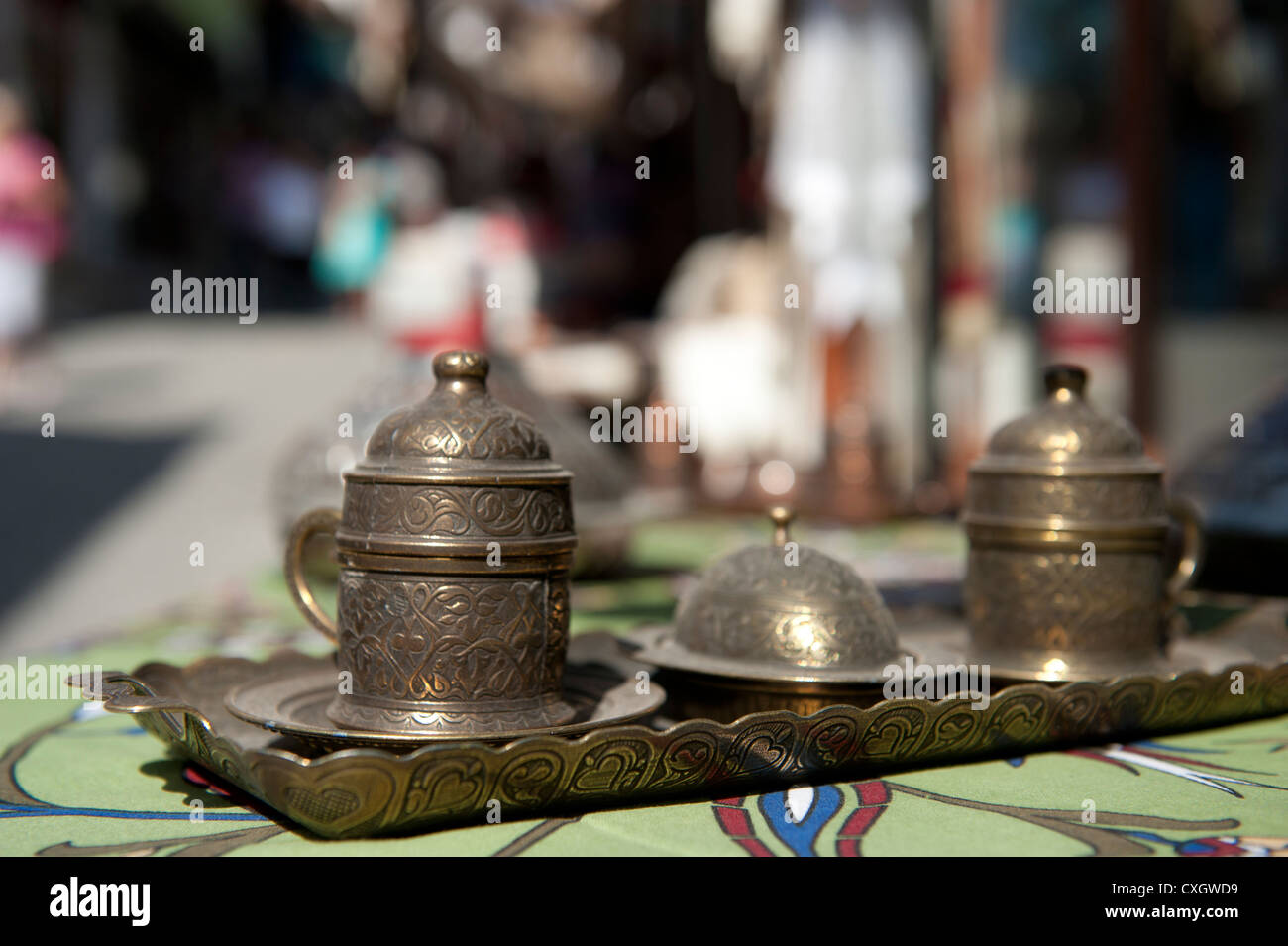 Adorned brass tea set sold by an antiques vendor in the old town of