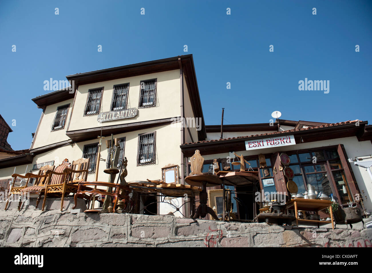 Antiques vendors display their goods and furnitures outdoors in the old