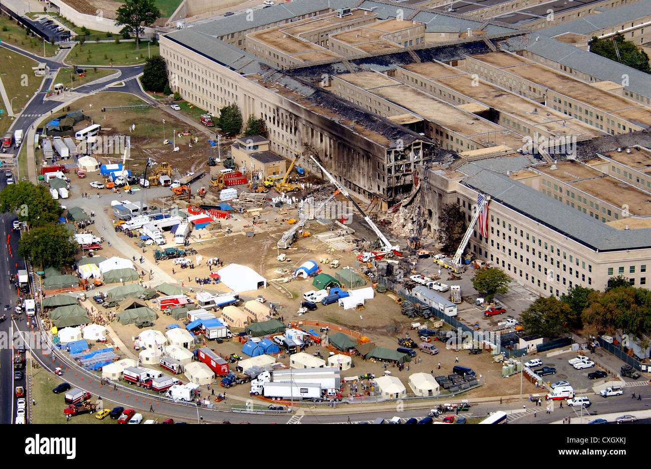 Aerial view showing the collapsed section of the Pentagon destroyed by a terrorist attack as recovery efforts continue September 14, 2001. On September 11th American Airlines Flight 77 hijacked by terrorists fly into the building killing all 64 passengers onboard and 125 people on the ground. Stock Photo