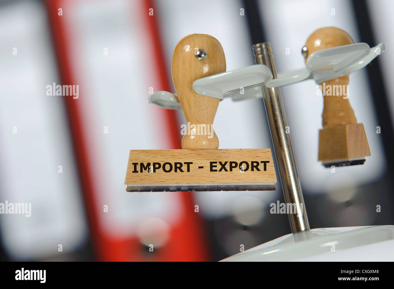rubber stamp marked with import - export Stock Photo
