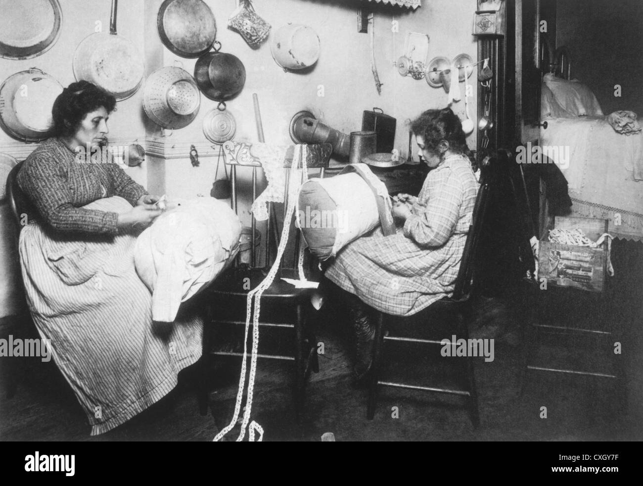 Photograph of Mother and Daughter Making Pillow Lace in Tenement Stock Photo