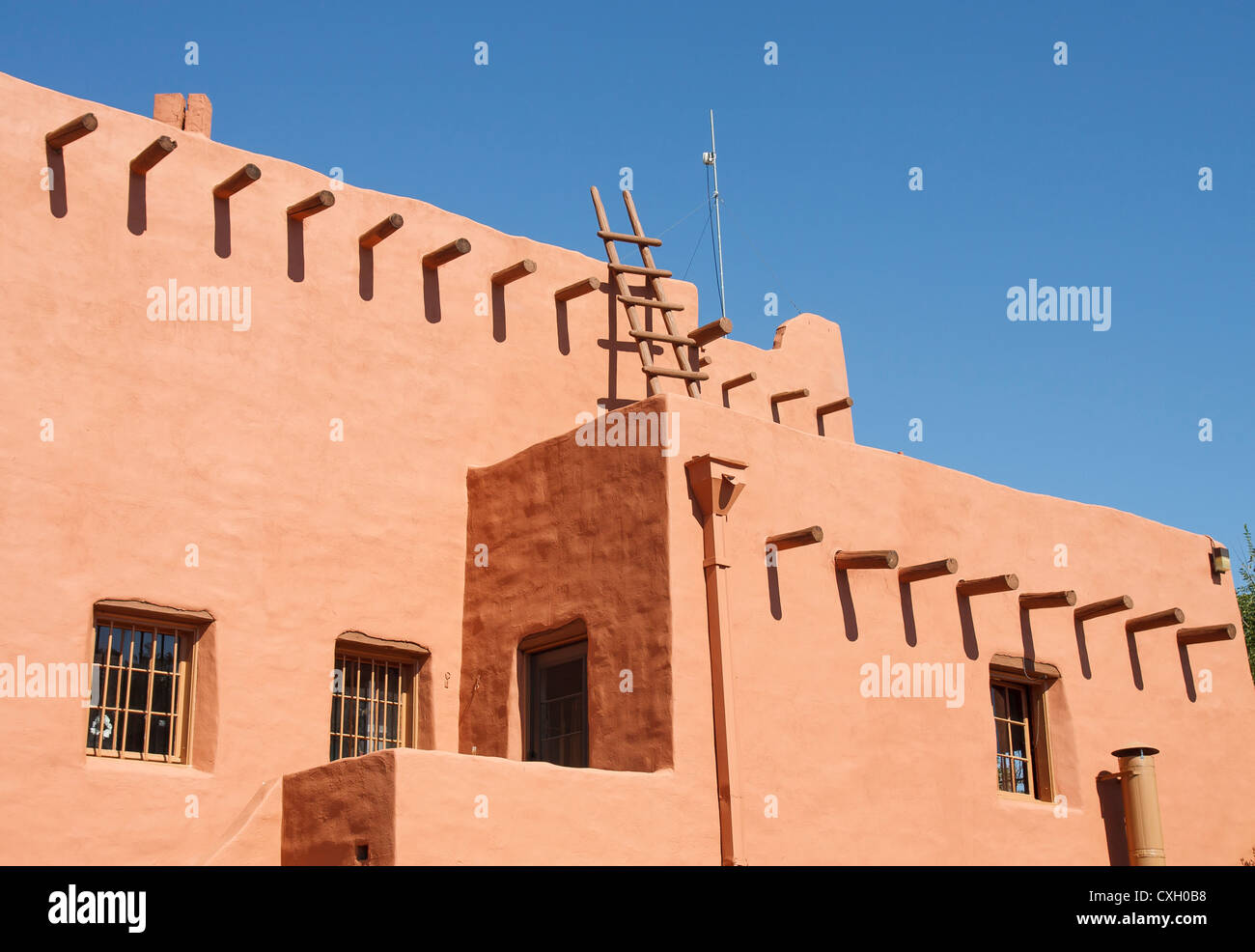 Navajo Pueblo architecture under a clear blue sky Stock Photo - Alamy