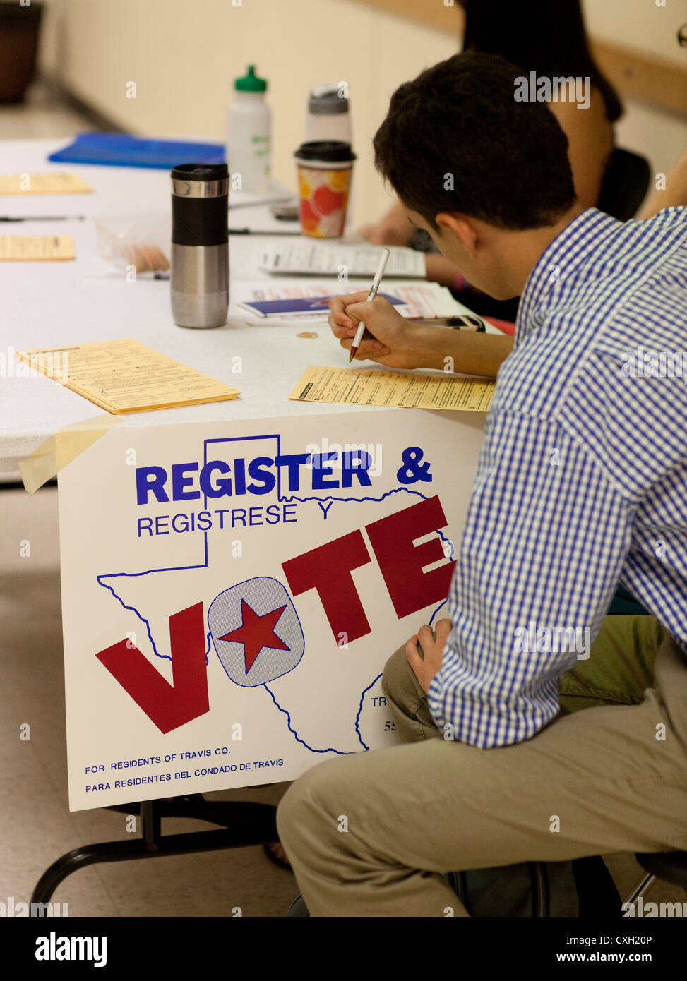 Volunteers conduct a voter registration drive for 18-year-olds at high school in Austin, TX. Many will be 1st-time voters n the Nov. 2012 election. Stock Photo