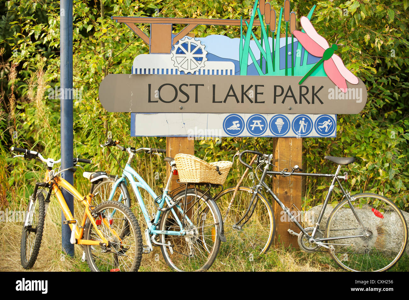 Sign for Lost lake Park with bicycles. Whistler BC, Canada Stock Photo