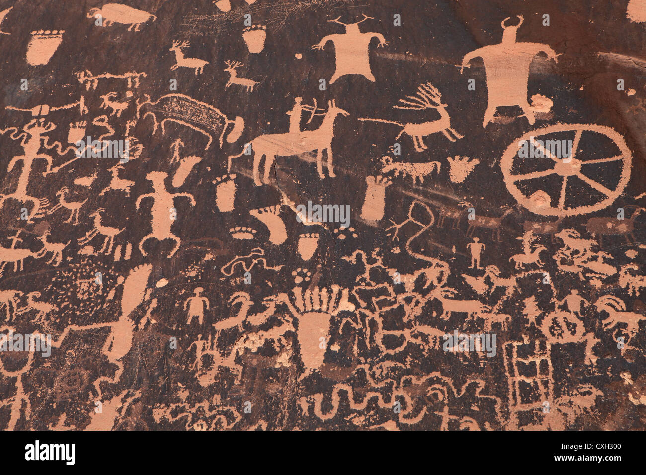 Ancient Indian petroglyph on rock in Moab, Utah, USA Stock Photo - Alamy