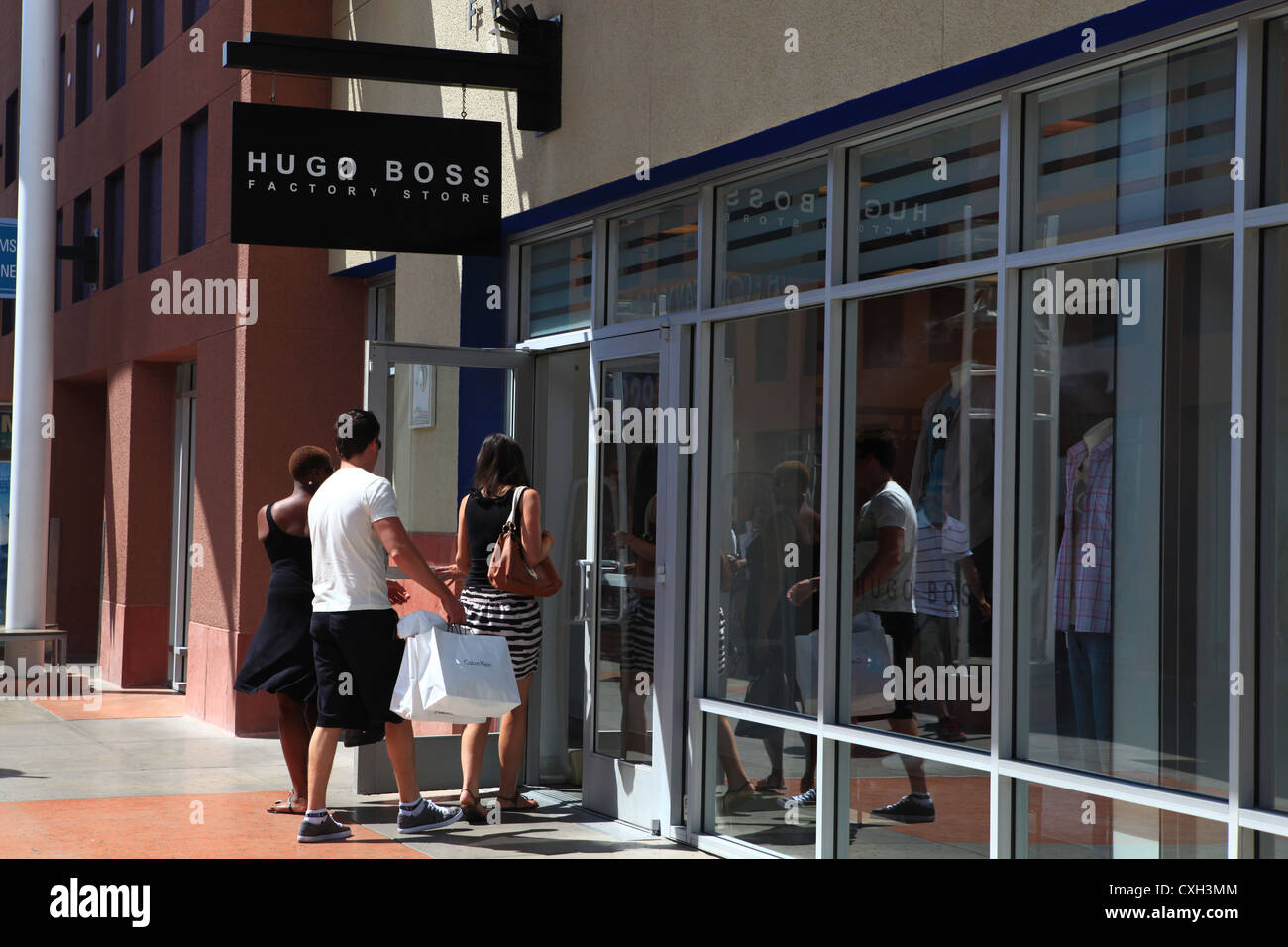 Shoppers walking into Hugo Boss clothing store Las Vegas North Premium  Outlets Shopping Mall, Las Vegas, Nevada, US Stock Photo - Alamy