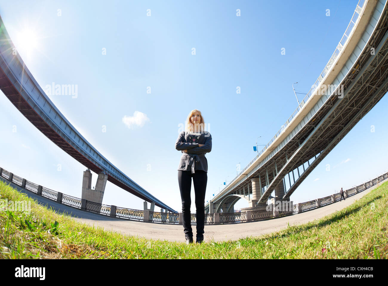 Beautiful woman between the bridges Stock Photo