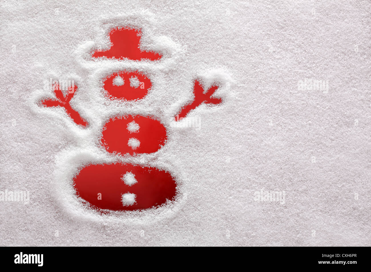 Snowman drawn in the snow Stock Photo