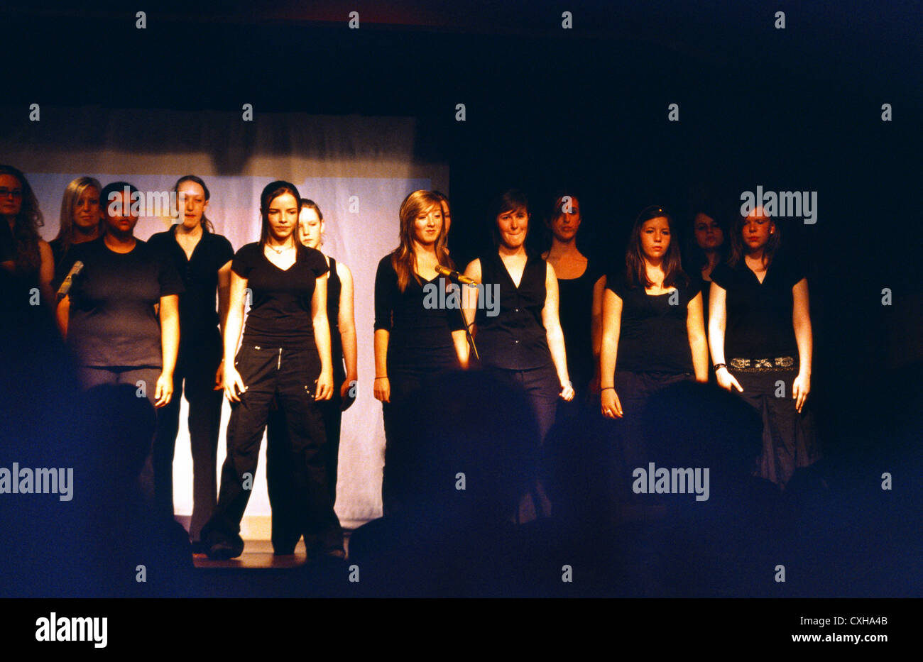 Teenage Girls Singing In Choir At A School Concert England Stock Photo