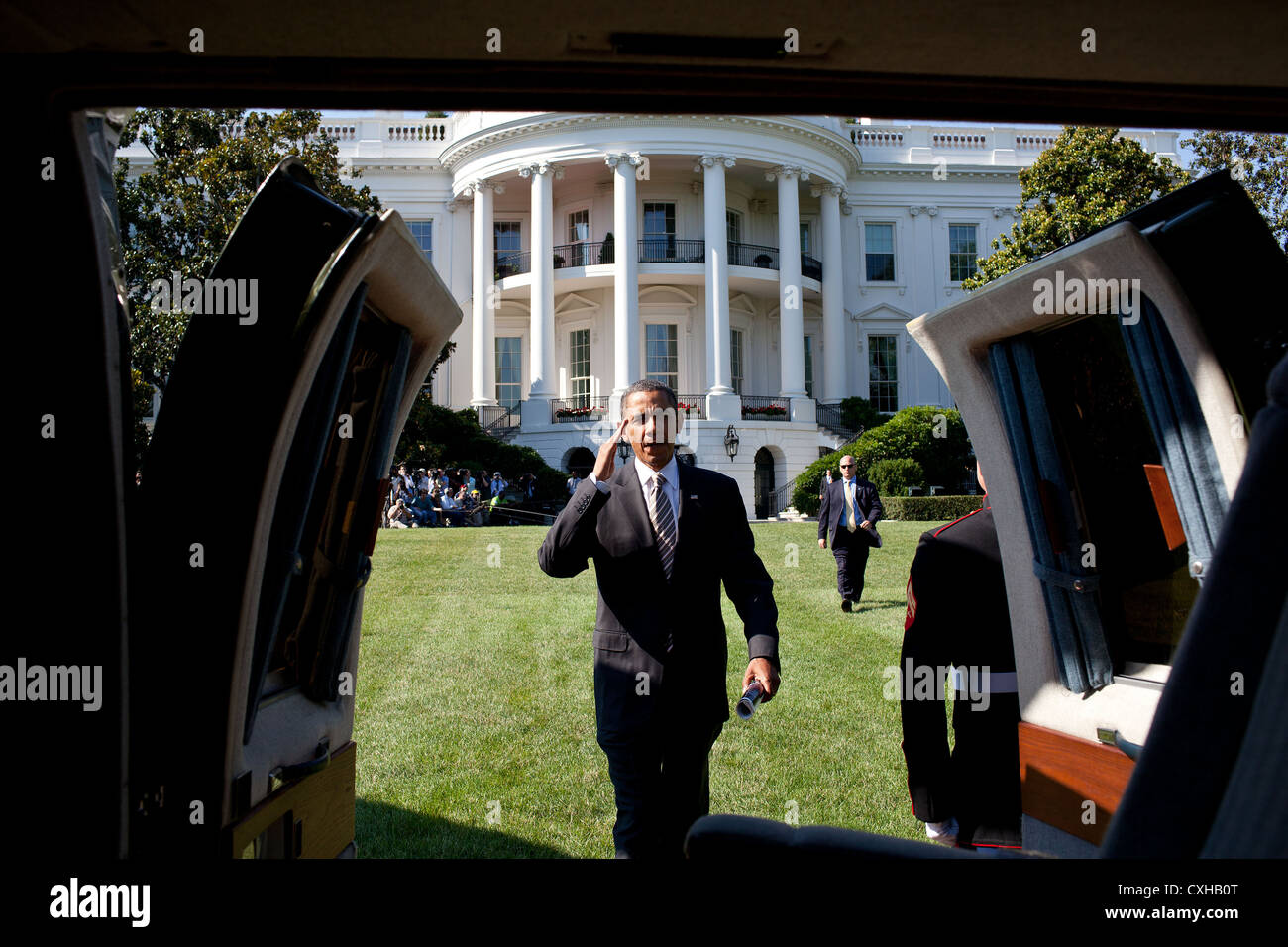 US President Barack Obama boards Marine One July 1, 2011 on the South Lawn of the White House. Stock Photo