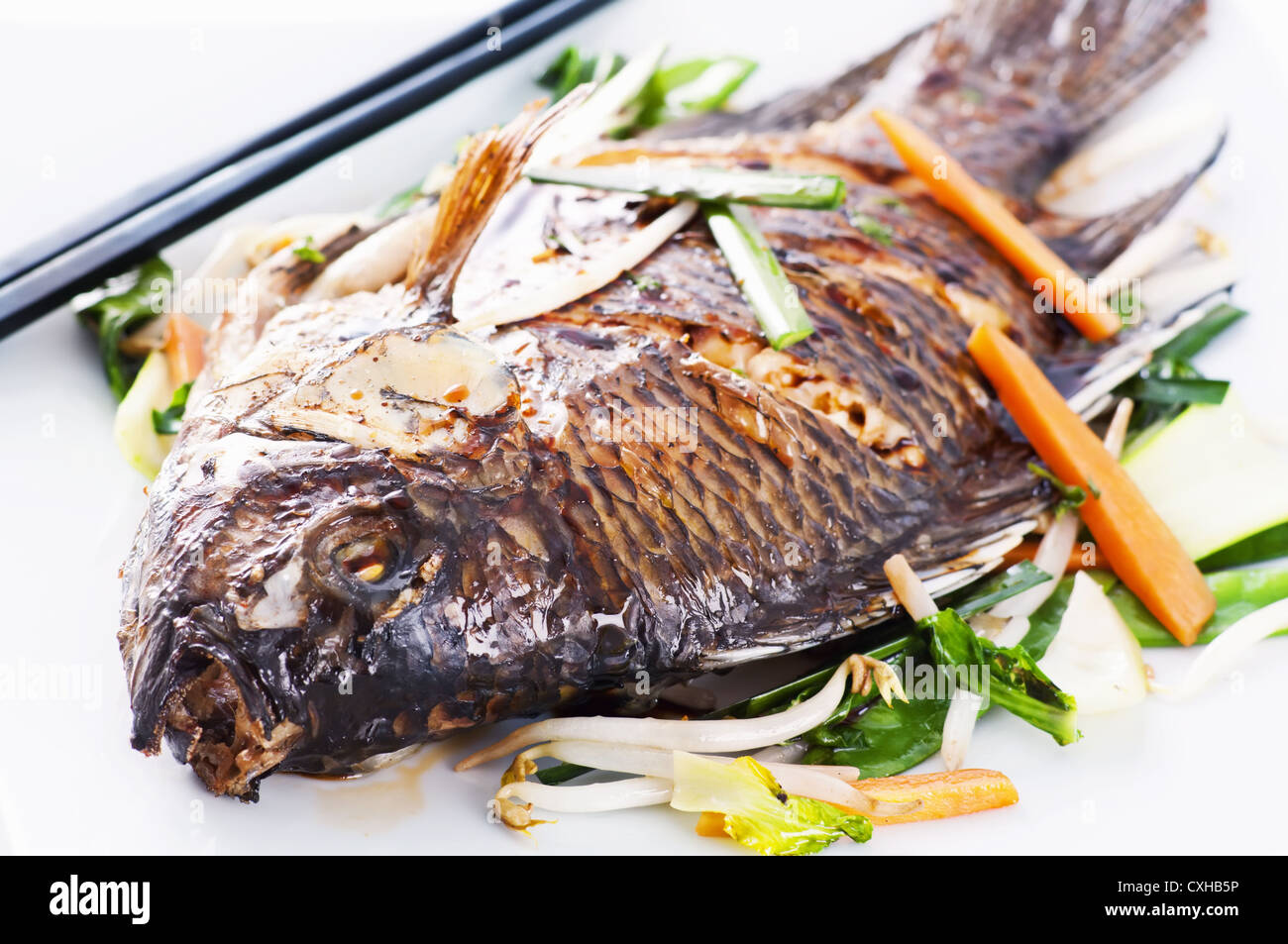 Tilapia fish grill fried hires stock photography and images Alamy