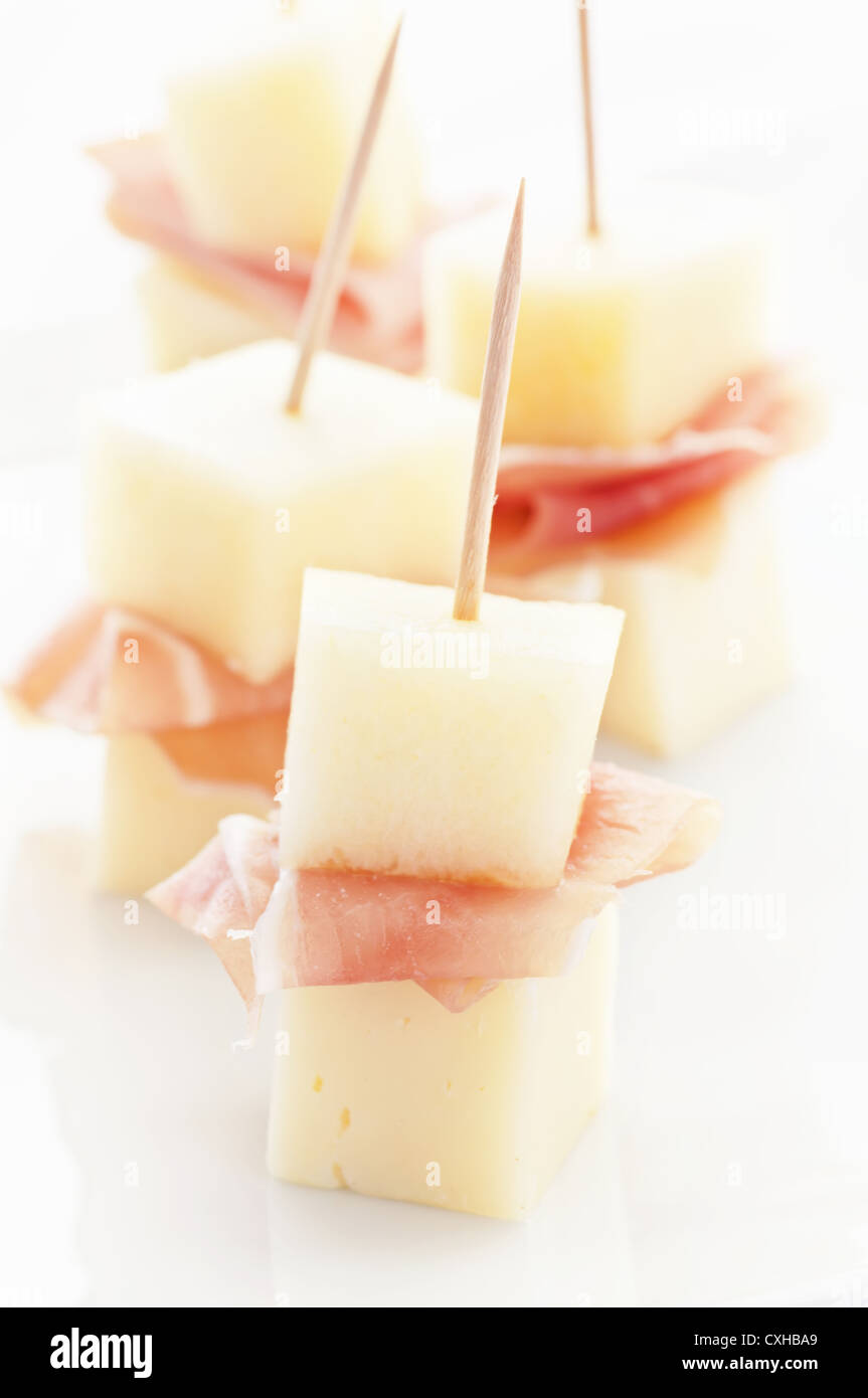 Canape with melon and proscuitto Stock Photo