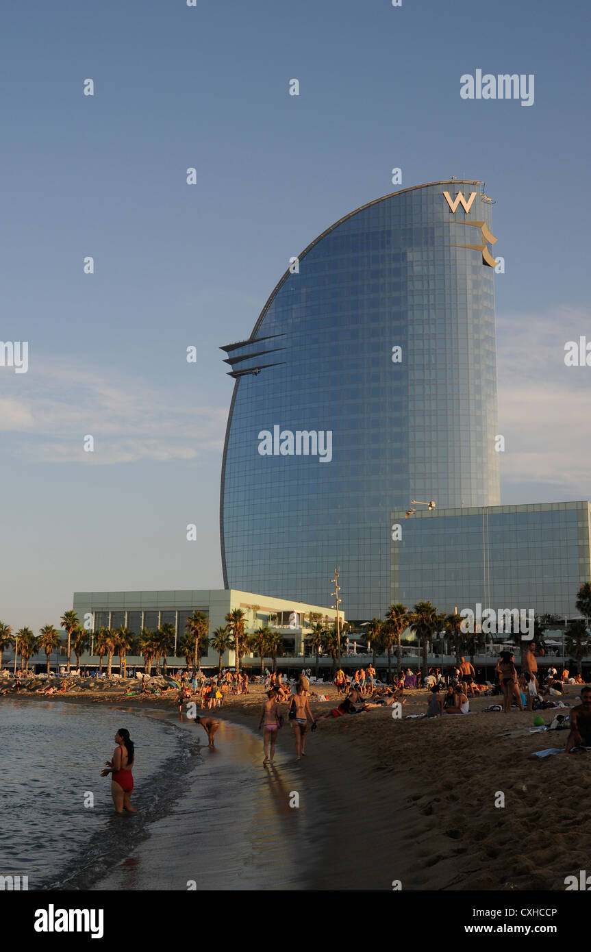 crowded beach and hotel W by Ricard Bofill architect Stock Photo