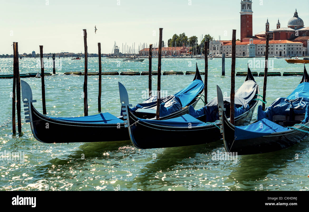 empty blue gondolas in lagoon Venice Italy Stock Photo - Alamy